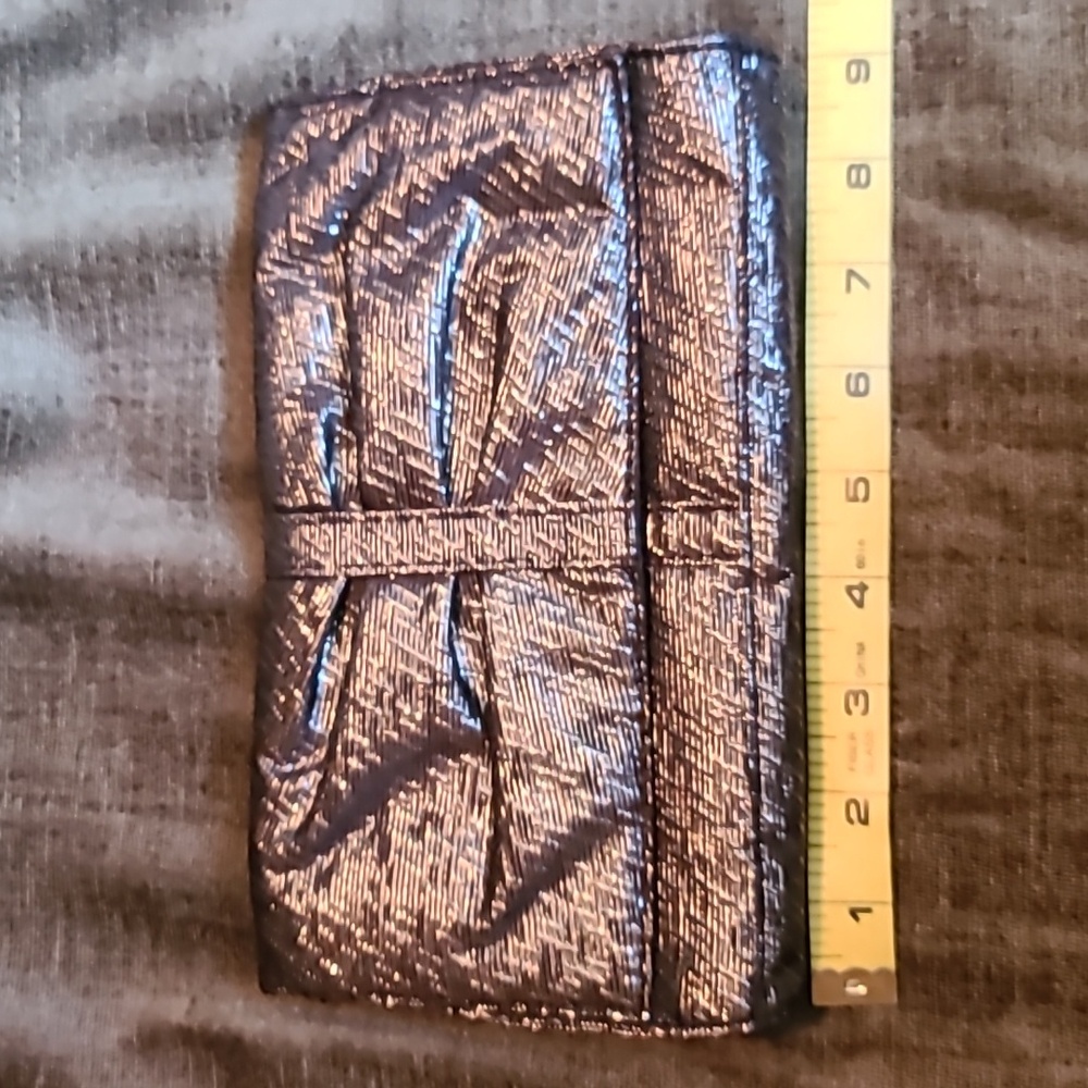 Lancome Paris silver and black clutch